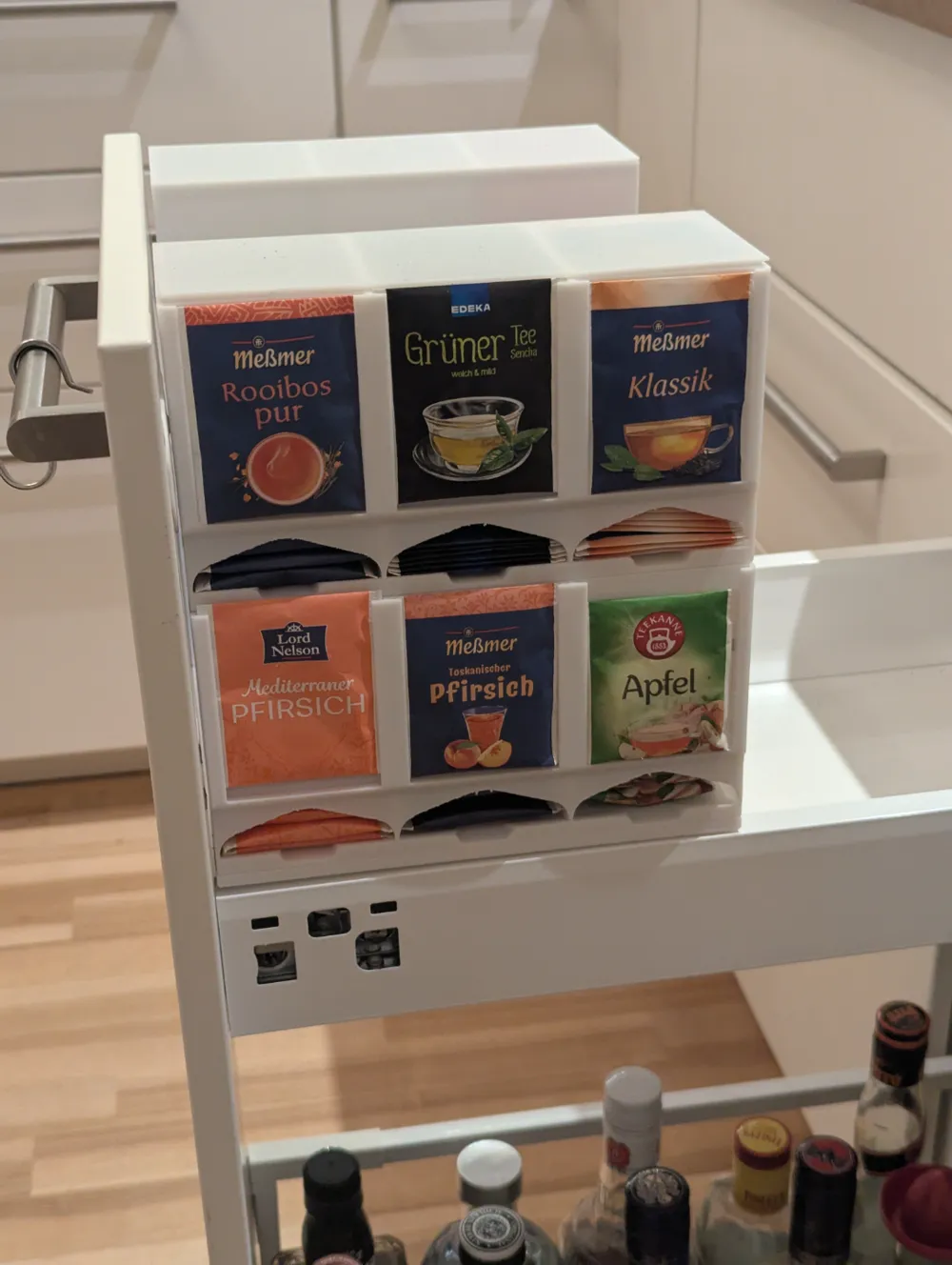 Tea rack placed inside the IKEA apothecary pull-out.